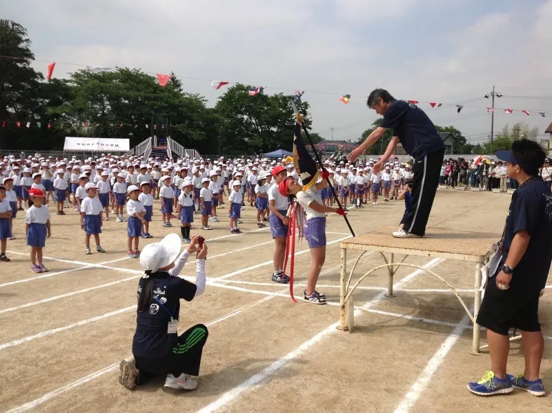 優勝旗返還