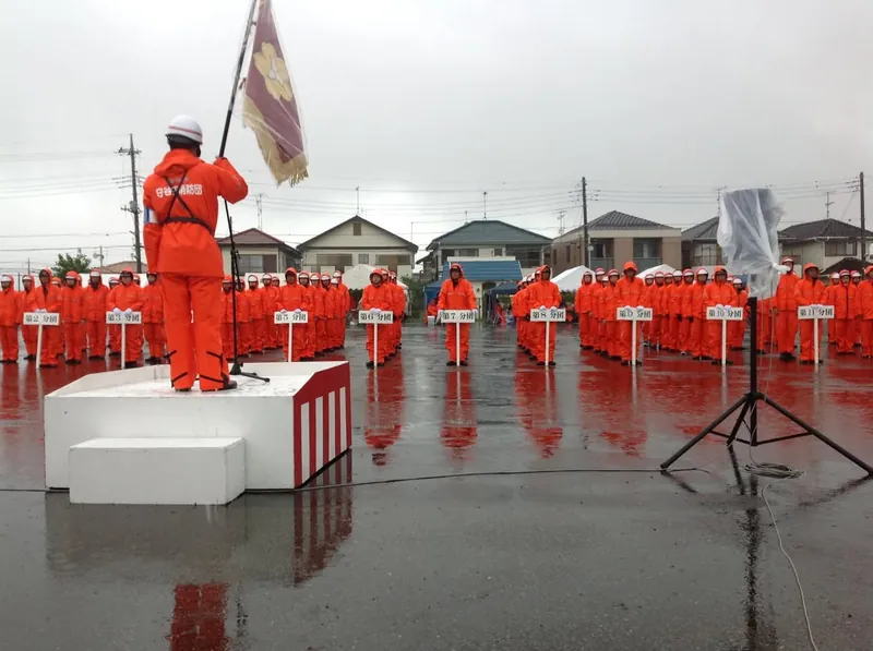 豪雨の中の大会の写真 5